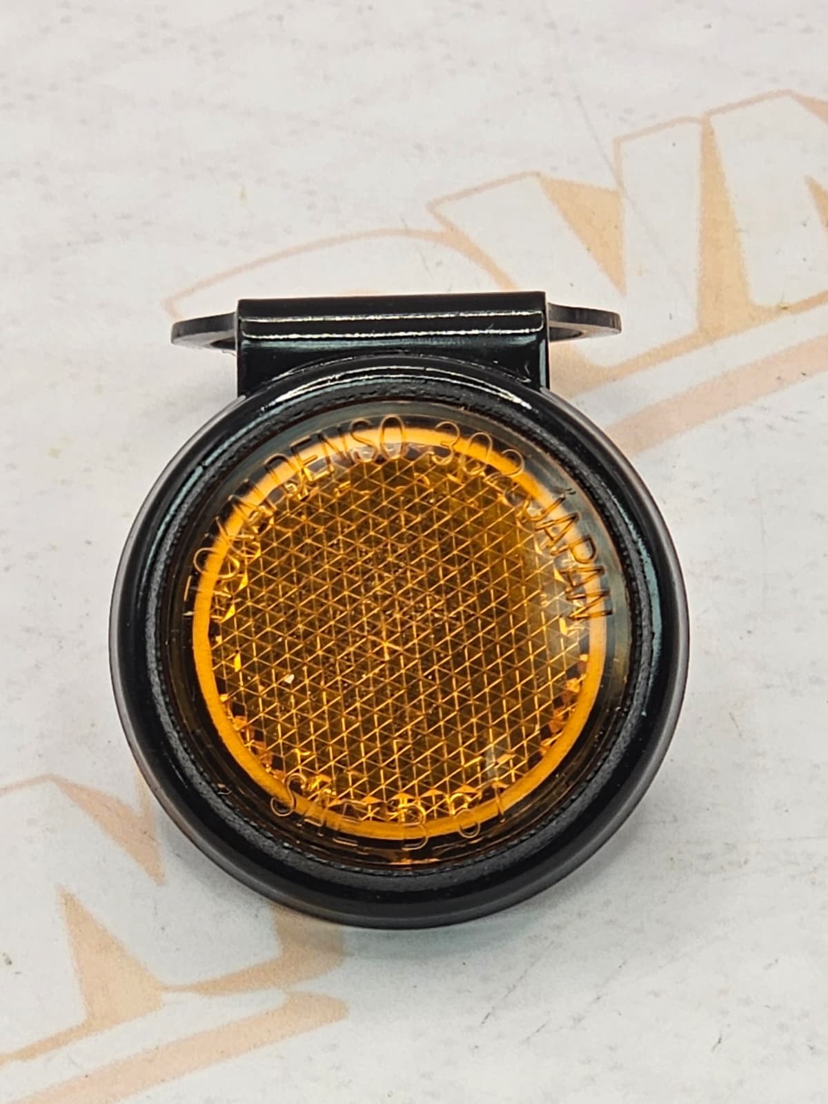 1970 Suzuki T250 Hustler front amber reflector with brackets Oem Japan